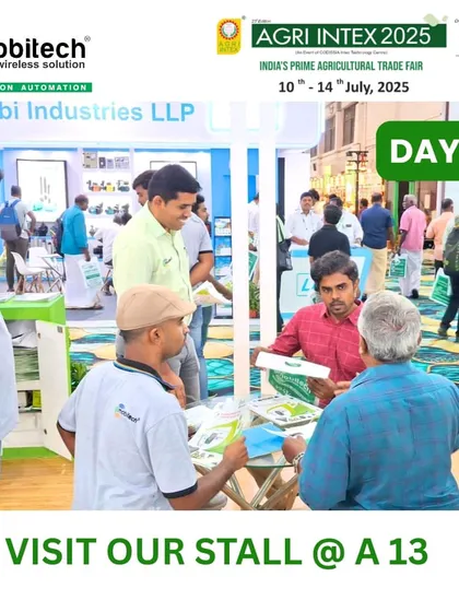 Our team members seated and explaining our solutions in detail to a group of farmers.