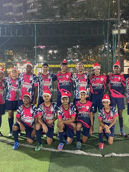 Our senior boys' team celebrating Christmas on the pitch with Santa hats. We love to mix fun and festivities with our training.