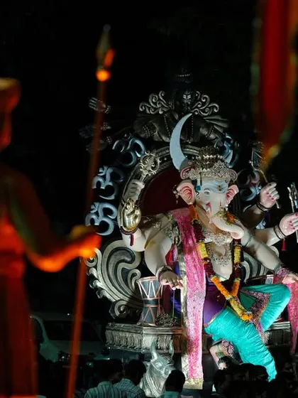 Another perspective shot featuring the Maratha warrior statue, providing a sense of protection and reverence towards the Sanpadya Cha Maharaja.
