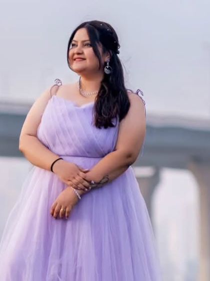A close-up of our lavender lilac net gown, showing the delicate texture of the fabric and its soft, romantic drape.