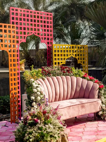 Another view of the pink sofa and colorful screens, showing how I layer different elements to create a rich, textured look.