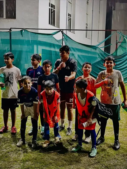 A team photo of our young squad after a fun and intense training session in the rain. We believe in training hard and enjoying the process together.