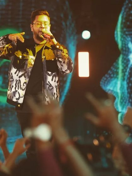 A shot from my "PTSD" performance. The crowd's hands up, feeling the vibe. This is why I make music.