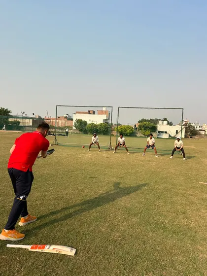 Using video analysis during a fielding drill session. Every aspect of the game is broken down and improved with technical feedback.