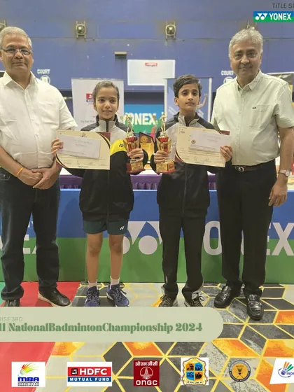 Chief guests Shri Arun Lakhani and Shri Mayur Parekh felicitating the winners of the Mini U-11 National Badminton Championship.