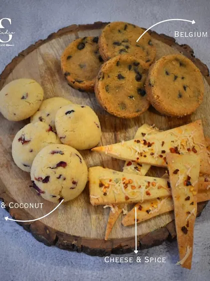 In our cookie masterclass, students learn to make a variety of gourmet cookies. This platter includes savory Cheese & Spice crackers, floral Rose & Coconut shortbread, and classic Belgian Sea Salt chocolate chip.