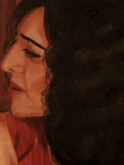 A detail shot focusing on the woman's portrait, showing the careful brushwork used to capture her profile and expression.