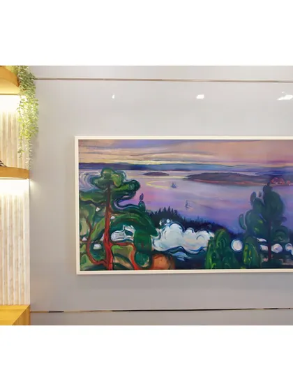 Another view of the Frame TV, showcasing its ability to display beautiful artwork and enhance the room's aesthetic.