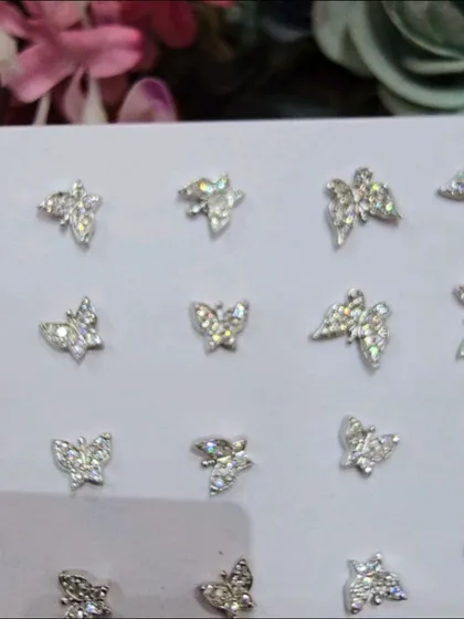 A variety of our butterfly-shaped studs, perfect for adding a touch of playful elegance to your ear stack.