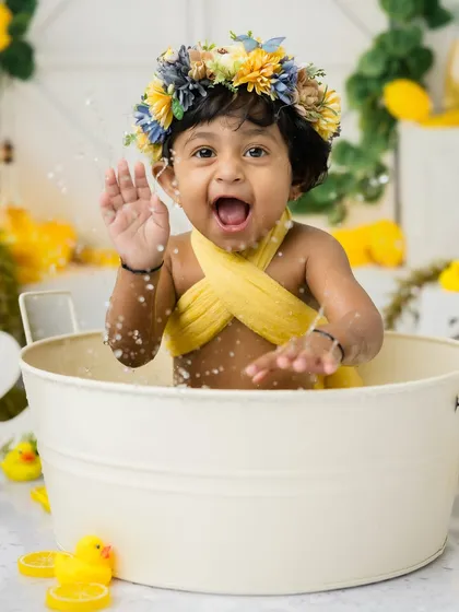 A big, happy shout! This little one is loving every second of her first birthday photoshoot experience.