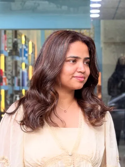 This Ginger Brown shade looks incredibly natural and sophisticated, especially when styled with soft, loose waves.