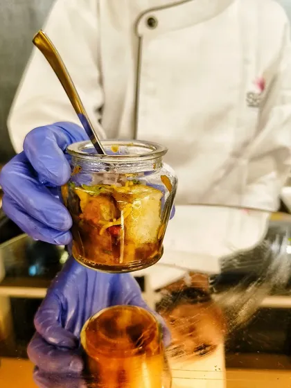 I love to reinvent classic street food. This is my deconstructed Dabeli, served in a jar. It layers all the tangy, spicy, and sweet flavors of the traditional Kutchi snack in a modern, easy-to-eat format.