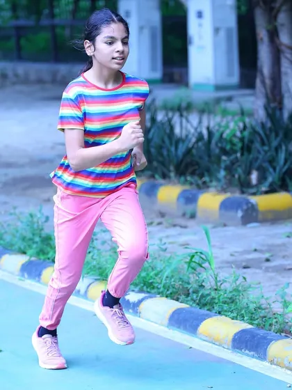 It's never too early to start. A young athlete from our group showing great running form during a training session. We welcome all age groups.