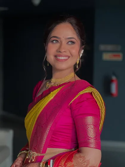 A beautiful profile shot of my bride, highlighting her glowing skin and the simple elegance of her vidhi look.