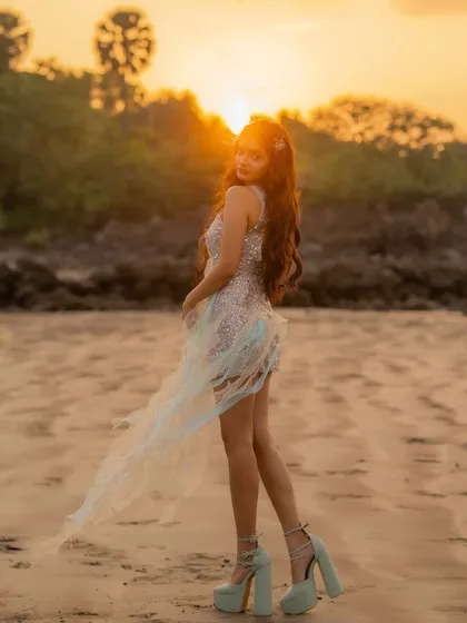 This is a moment from a music video I styled for Anushka Sen. The custom sequined dress with its ethereal, flowing fabric was designed to catch the golden hour light perfectly, creating a magical, mermaid-like fantasy on the beach.