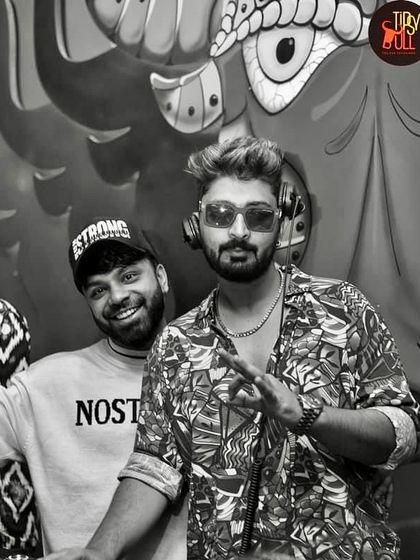 A black and white shot with a friend at Tipsy Bull.