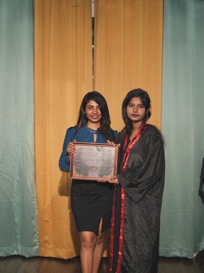 A proud moment for both me and my student on graduation day.