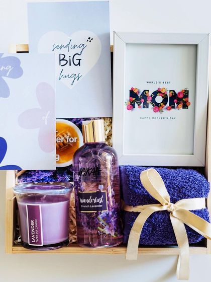 The lavender-themed pamper hamper for Mom, beautifully arranged in a wooden crate.
