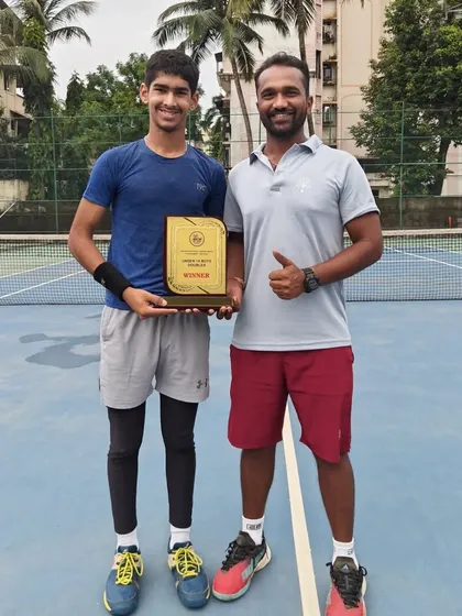 Dhruv Sehgal with his winner's plaque after securing the U-14 Doubles title at the All India National Series in Hyderabad. We train our players to be strong doubles competitors.