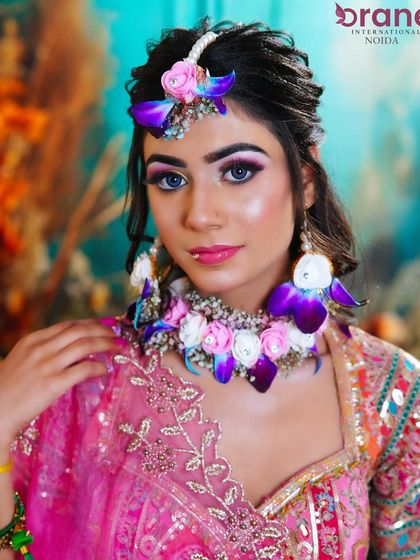 A beautiful portrait that captures the joy and color of a Haldi ceremony, a key event for any bridal makeup artist.