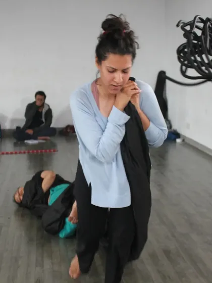 A photo from a research session for 'The Breath Way', a workshop I co-facilitated. This shows my work in an educational setting, exploring creativity through bodywork, material play, and breath.