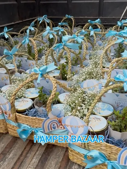 Getting a large order of hot air balloon hampers ready for delivery. The fresh flowers add such a delicate touch.