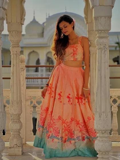 A photoshoot in a beautiful palace-like setting. The right location and outfit can make you feel like royalty, which is the vibe I aim for in my sangeet choreography.