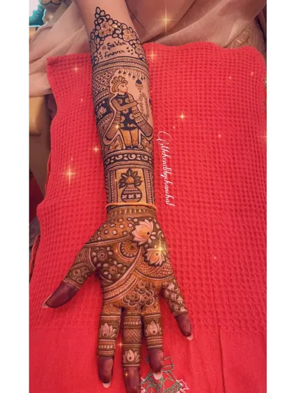 A full-arm design featuring a portrait of the groom with the words "Saajan ji ghar aaye" (My beloved has come home).