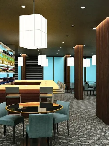 The indoor amenities at Embrace Towers include this sophisticated lounge and dining area. The design provides a tailor-made space for residents to socialize and relax in style.