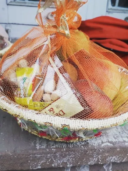 A beautifully packed gift basket prepared for the guests at the destination wedding. We can assist with all food-related aspects of your event.