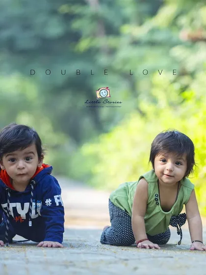 Capturing the energy of twins is always an adventure. This candid shot of them on the move shows their shared journey and individual curiosity during their twin photography session.