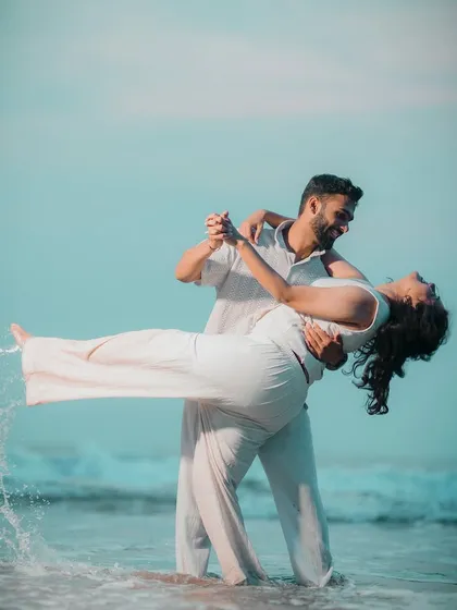 My services extend beyond Jaipur to dream destinations like Goa. I love capturing the carefree energy of a beach pre-wedding shoot, from playful moments by the waves to romantic dips in the ocean.