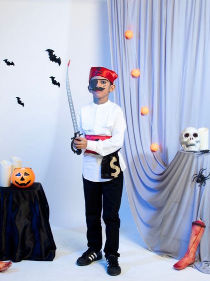 A full-length shot of the child's pirate costume.