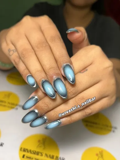 This is a futuristic take on the aura trend. I used a light blue center with a dark outline and a silver chrome border to create a striking, modern design.