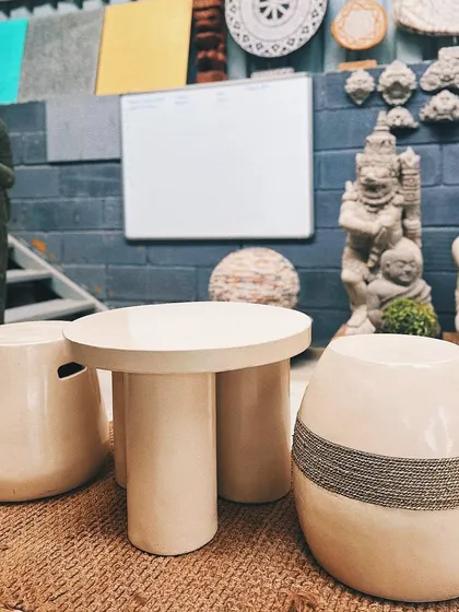 We hear your requests for minimal outdoor furniture. This set, featuring a three-legged table and matching stools, offers a chic, modern solution for your patio or balcony.
