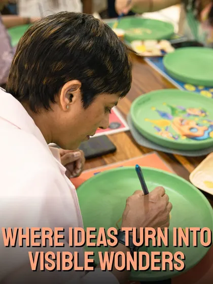 At The Art Hub, ideas turn into visible wonders. This student is carefully adding details to her hand-painted plate during a workshop, completely absorbed in the creative process.