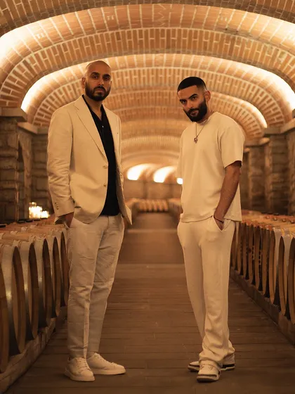Me and my brother Arvee in the wine cellars of the Il Borro estate in Tuscany. We always take time to explore the unique features of our wedding venues.