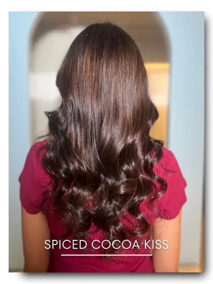 For those who love a hint of warmth, our Spiced Cocoa Kiss is the perfect choice. This rich brunette shade is infused with subtle cinnamon and red undertones for a warm, spicy, and dimensional finish.