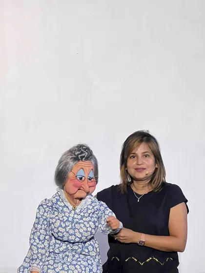 With Granny at an Everest Toastmasters fundraiser. We had a great time performing for a good cause.