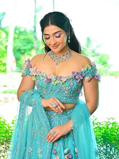 This look is perfect for a themed party or a bride who wants a true fairytale moment. The soft colors and floral details are incredibly romantic.