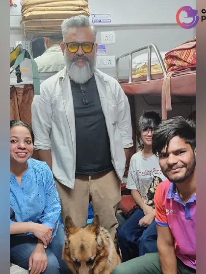 Oscar the German Shepherd and his family, along with a member of my team, in their first-class coupe for the journey from Delhi to Bengaluru.