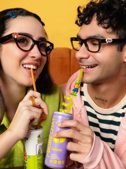 This shot from the Lenskart ad captures a cute, casual date vibe. I styled the models in complementary pastel and neon colors to create a visually sweet moment.