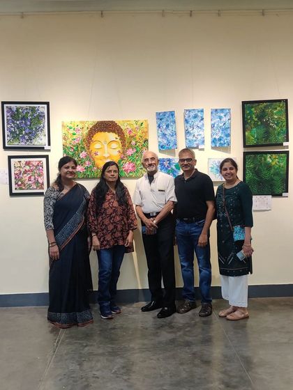 A group of visitors and artists at the CKP gallery.