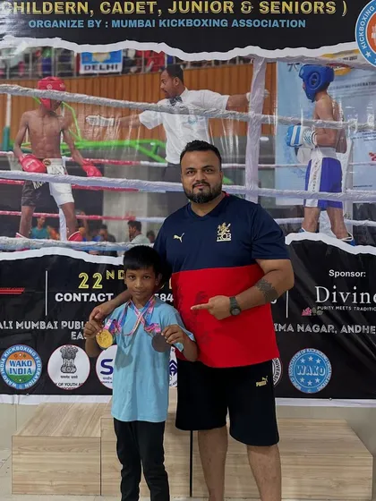 Me with Ansh Gupta and his impressive collection of medals from the kickboxing championship. His hard work and warrior spirit shine through.