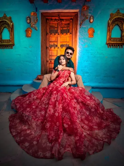 The full flare of the floral organza gown is on display here. It's lightweight and flows beautifully, creating dynamic and romantic poses.