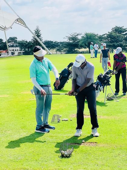 Our coaches are constantly on the range, providing hands-on instruction. From demonstrating a swing path to analyzing a student's setup, these moments of direct mentorship are where real progress is made.