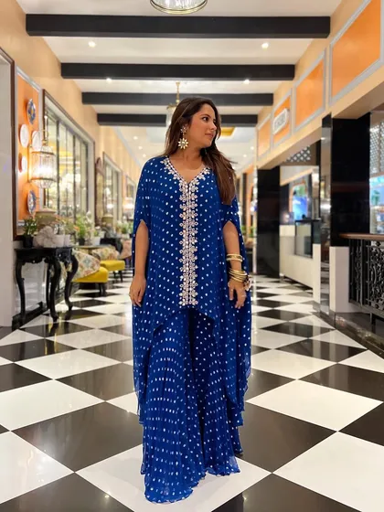 A full-length view of my blue ensemble in this stunning checkered hallway. The outfit and the location were a perfect match.