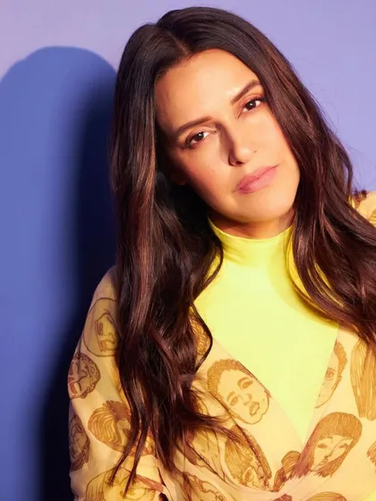 I love working with bold and unconventional pieces. Here, I styled Neha Dhupia in a unique printed dress from Huemn, paired with vibrant neon yellow gloves for a high-impact, artistic statement.