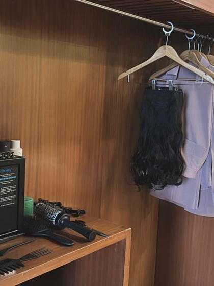 Behind the scenes of a bridal booking. Every detail is planned, from the makeup and tools to the hair extensions and styling equipment.