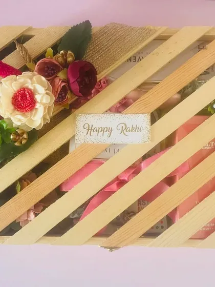 This wooden box with a slatted lid was customized for Rakhi for a brother, sister-in-law, and niece.